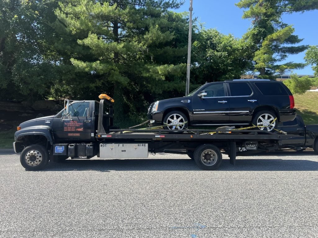 i got whipz towing & Roadside assistance with a Cadillac Truck towing near me from 9400 Deereco rd Timonium MD 21093