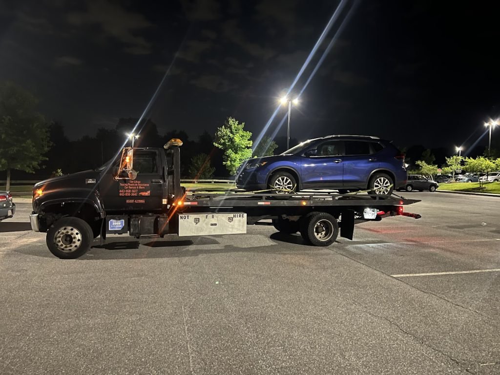 I got Whipz Towing & Roadside Assistance with a Nissan Rogue towing near me at 3500 St. Johns Ln Ellicott City,MD 21042