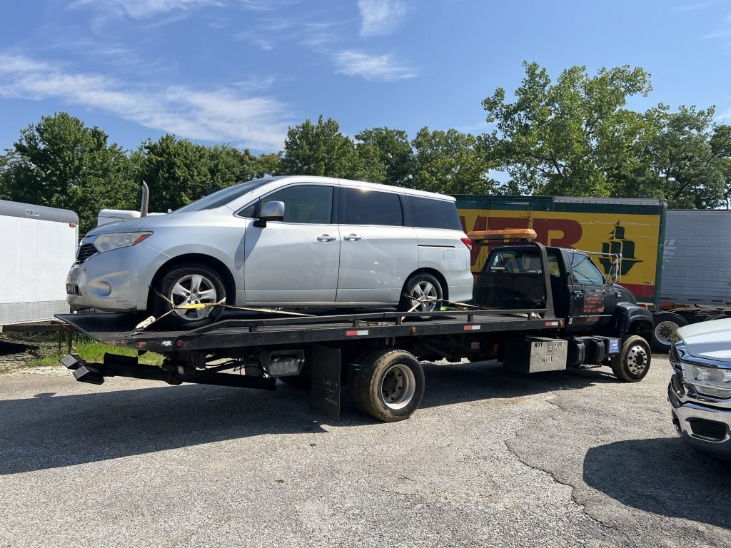I Got Whipz Towing & Roadside Assistance with a Nissan Van towing near me at 2900 liberty heights ave Baltimore,MD 21215