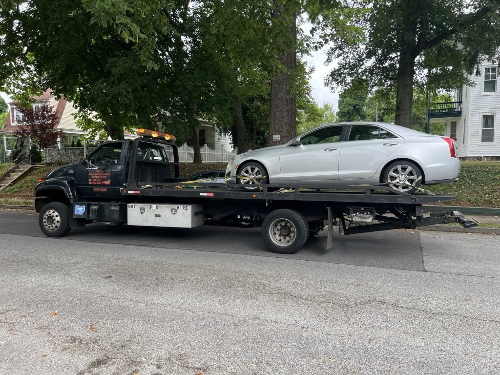 I Got Whipz Towing & Roadside Assistance with a Cadillac CTS towing near me from 4200 Ridgewood ave Baltimore,MD 21215 to 9025 Baltimore National Pike, Ellicott City, MD 21042