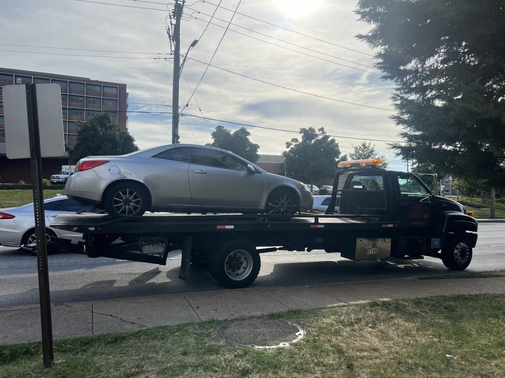 I Got Whipz Towing & Roadside Assistance with a pontiac g6 towing near me from 900 S Caton ave Baltimore,MD 21229 to Pikesville,MD 21208