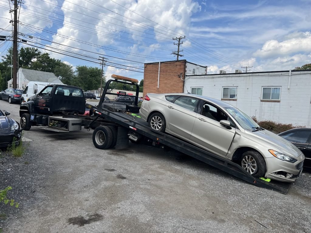 I Got Whipz Towing & Roadside Assistance with a ford fusion towing near me from 6500 quad ave Baltimore,MD 21205 to towson,MD 21286