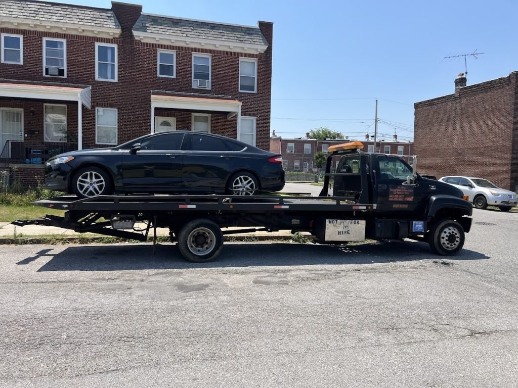 I got Whipz Towing & Roadside Assistance with a blk ford fusion towing near me from 4100 Brendan ave Baltimore,MD 21213 to Rosedale,MD 21237