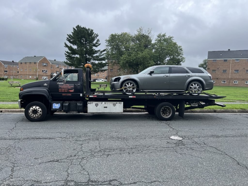 I got Whipz Towing & Roadside Assistance with a dodge magnum on 22's towing near me from 5200 parkside dr baltimore,MD 21213 to 7800 Crilley rd Glen Burnie,MD 21060