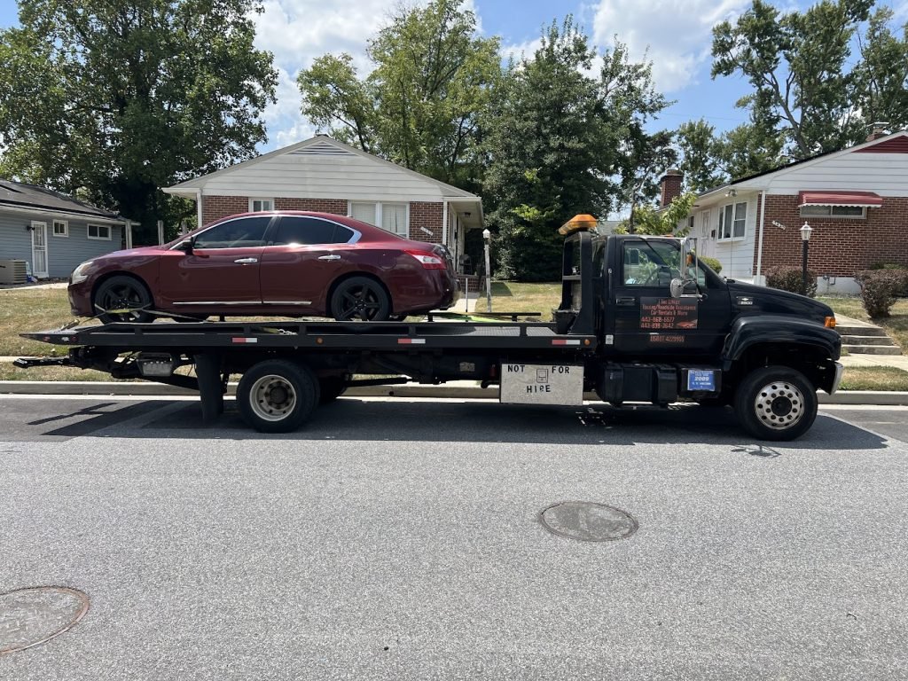 I got Whipz Towing & Roadside Assistance with red maxima towing near me at 7500 Digby rd Baltimore,MD 21207