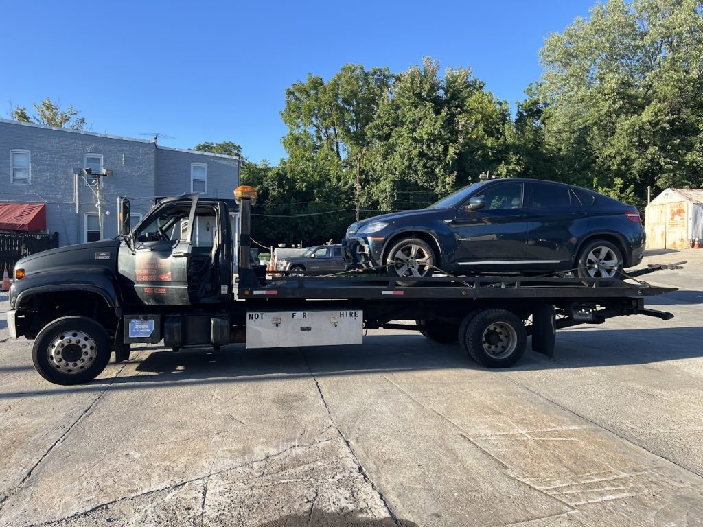 I got Whipz Towing & Roadside Assistance with a blk Bmw X5 towing near me from 500 S. Caton ave Baltimore,MD 21229 to 6300 Pulaski Hwy Rosedale,MD 21237