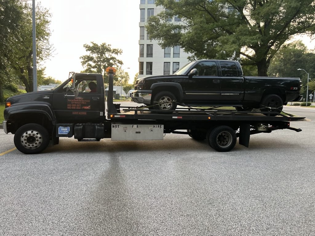 I got Whipz Towing & Roadside Assistance with a blk GMC 1500 towing near me from 695-W Baltimore,MD 21286 to Pikesville, MD 21208