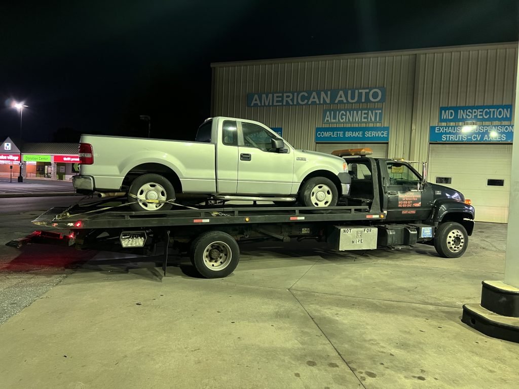 I got Whipz Towing & Roadside Assistance with a gry ford f150 towing near me from 5300 Ritchie Hwy Baltimore, MD 21225 to Woodlawn, MD 21244