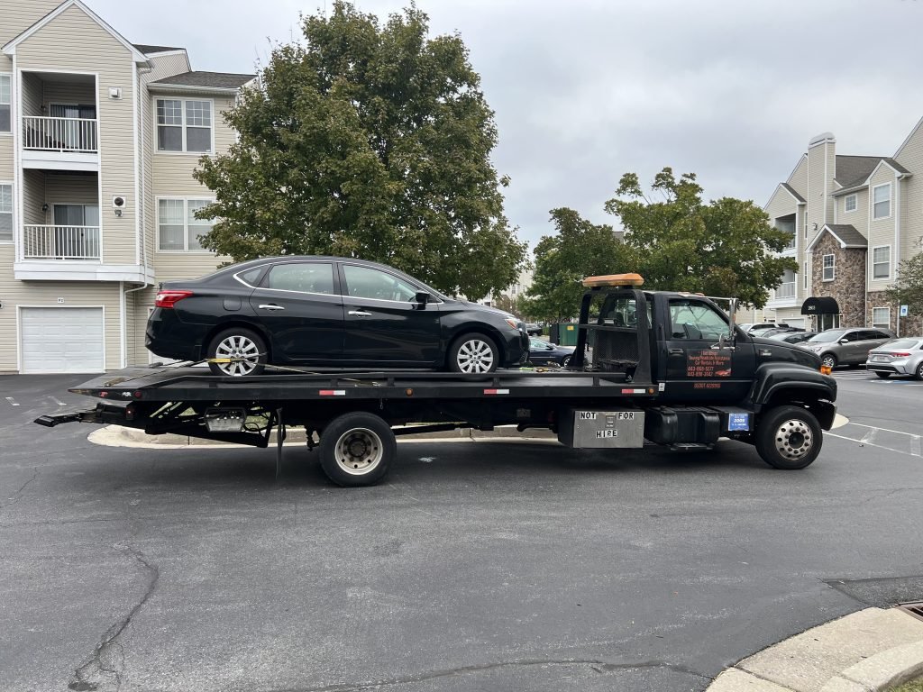I got Whipz Towing & Roadside Assistance with a blk nissan sentra towing near me from 7400 chadwell cir Windsor Mill, MD 21244 to 1800 Gwynn Oak Woodlawn, MD 21207