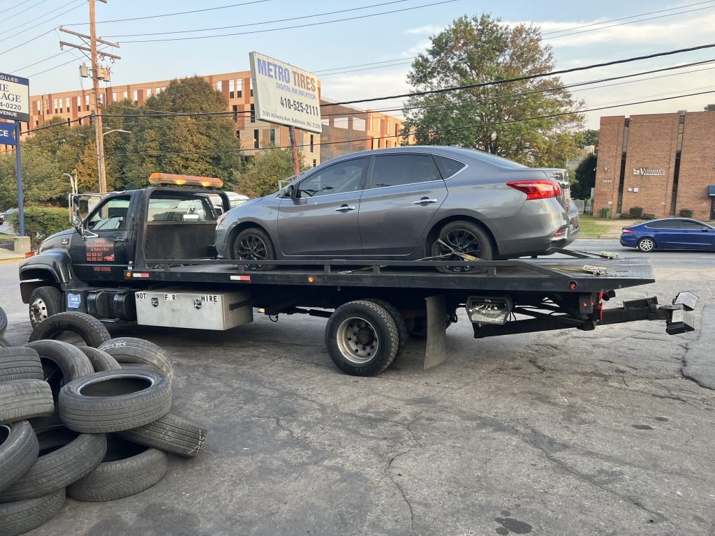 I got Whipz Towing & Roadside Assistance with a gray nissan sentra towing near me from 70-E Ellicott City, MD 21041 to 3500 Wilkens Ave Baltimore, MD 21229