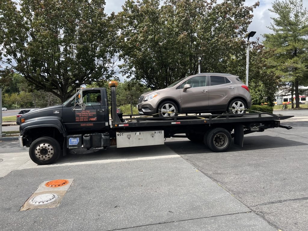 I got Whipz Towing & Roadside Assistance with a brown Buick encore towing near me from 4600 W Northern Parkway Baltimore, MD 21215 to 11234 Reisterstown MD Owings Mills, MD 21117