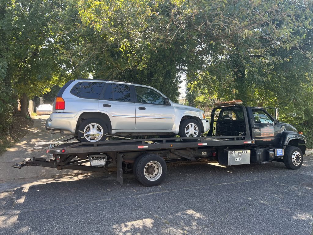 I got Whipz Towing & Roadside Assistance with a Gmc Envoy towing near me from 3500 Hamilton ave Baltimore, MD 21214 to 100 Kresson st Baltimore,MD 21224