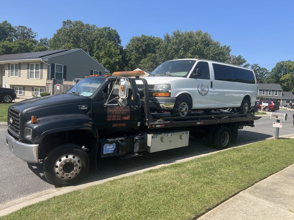 I got Whipz Towing & Roadside Assistance with a white chevy 2500 towing near me from 7700 Donegal Bay Dr Glen Burnie, MD 21060 to 9500 Pulaski Highway Rosedale, MD 21237
