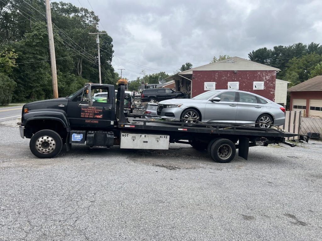 I got Whipz Towing & Roadside Assistance with a honda accord towing near me from 1600 fairmount rd Hampstead,MD 21074 to 10210 Mill Run Cir Owings Mills, MD 21117