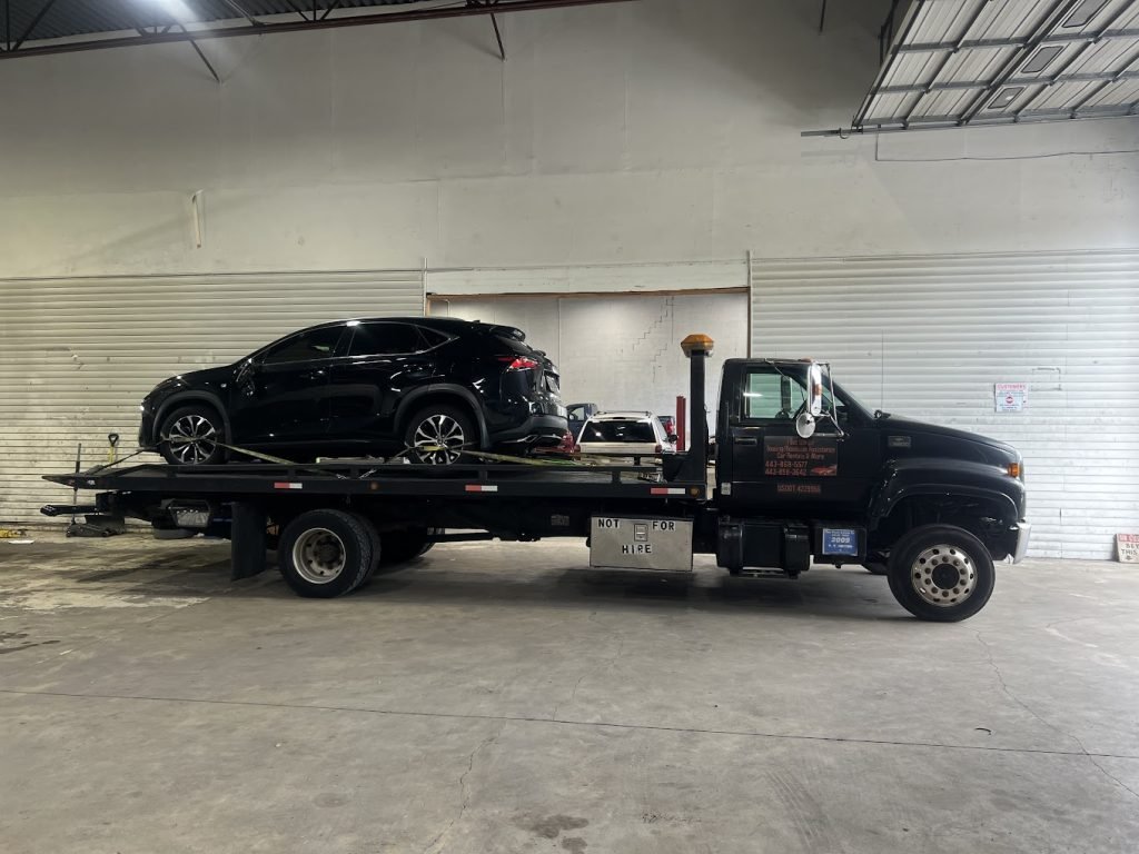I got Whipz Towing & Roadside Assistance with a blk lexus nx250 towing near me from 4600 Marielle Dr Rosedale, MD 21237 to 6501 Pulaski Hwy Baltimore, MD 21237