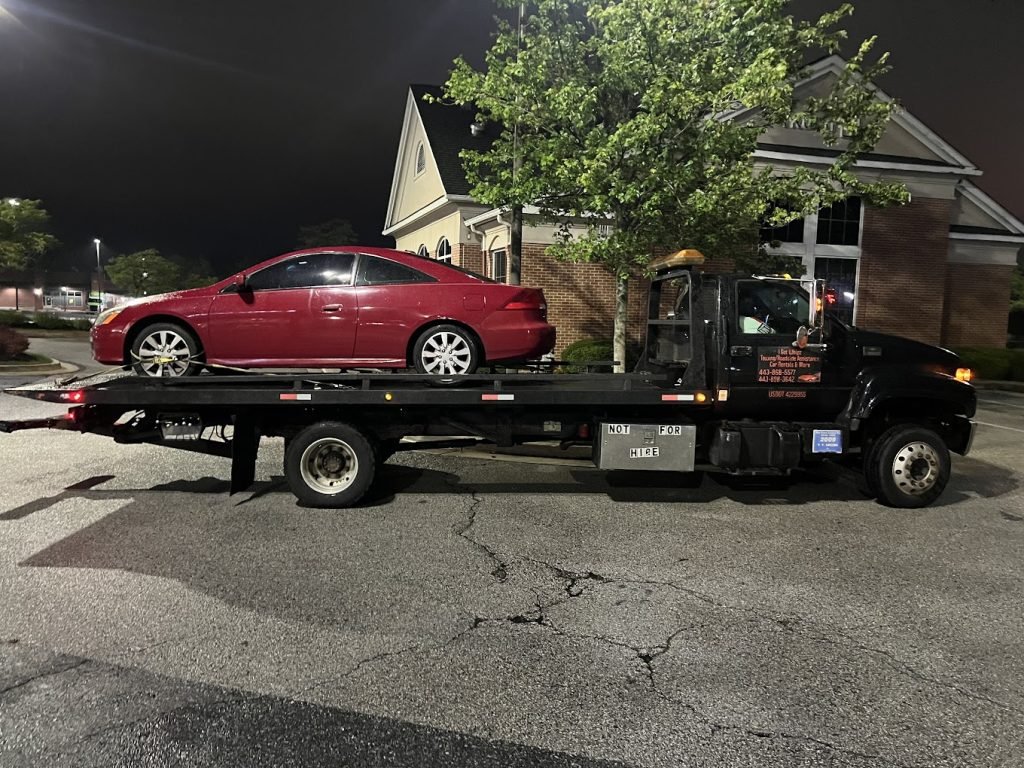 I got Whipz Towing & Roadside Assistance with a red honda coupe towing near me from 7100 Security Blvd Baltimore, MD 21244 to 2600 Rolling Rd Windsor Mill, MD 21244