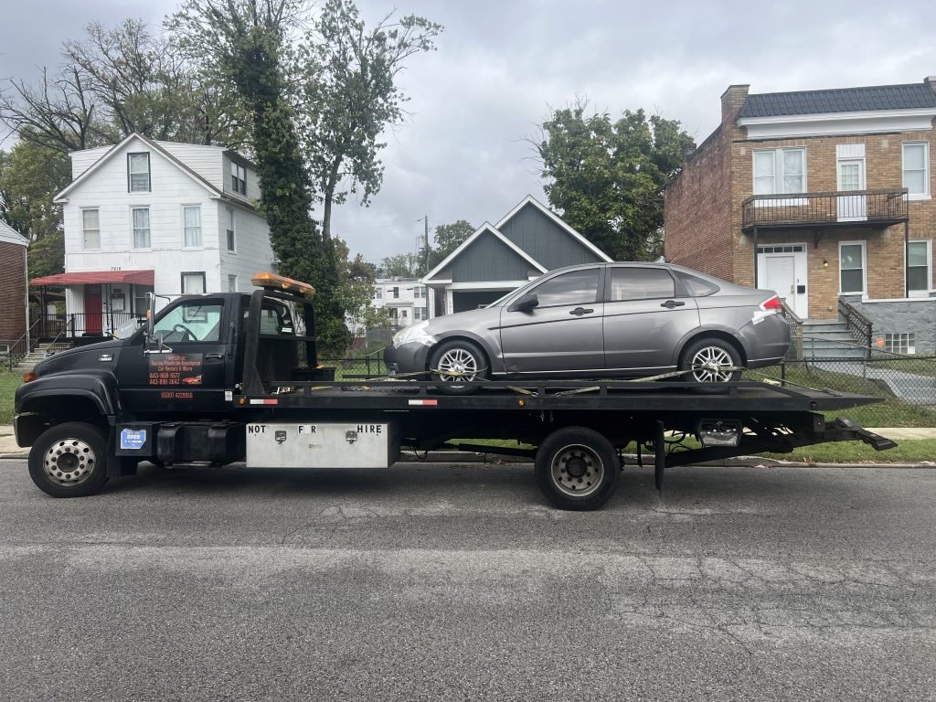 I got Whipz Towing & Roadside Assistance with a grey ford focus towing near me from 3900 Belle Ave Baltimore, MD 21215 to 5900 Liberty rd Baltimore, MD 21207