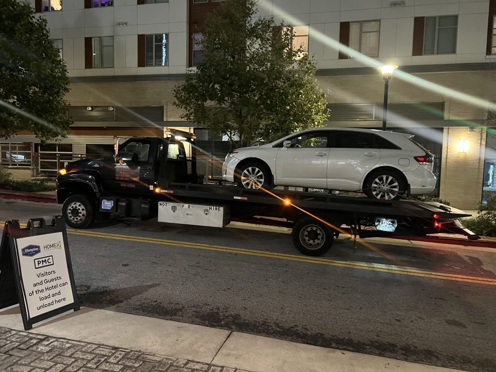 I got Whipz Towing & Roadside Assistance with a White Toyota Sienna towing near me from I-695 W to 1700 whitehead rd Woodlawn, MD 21207
