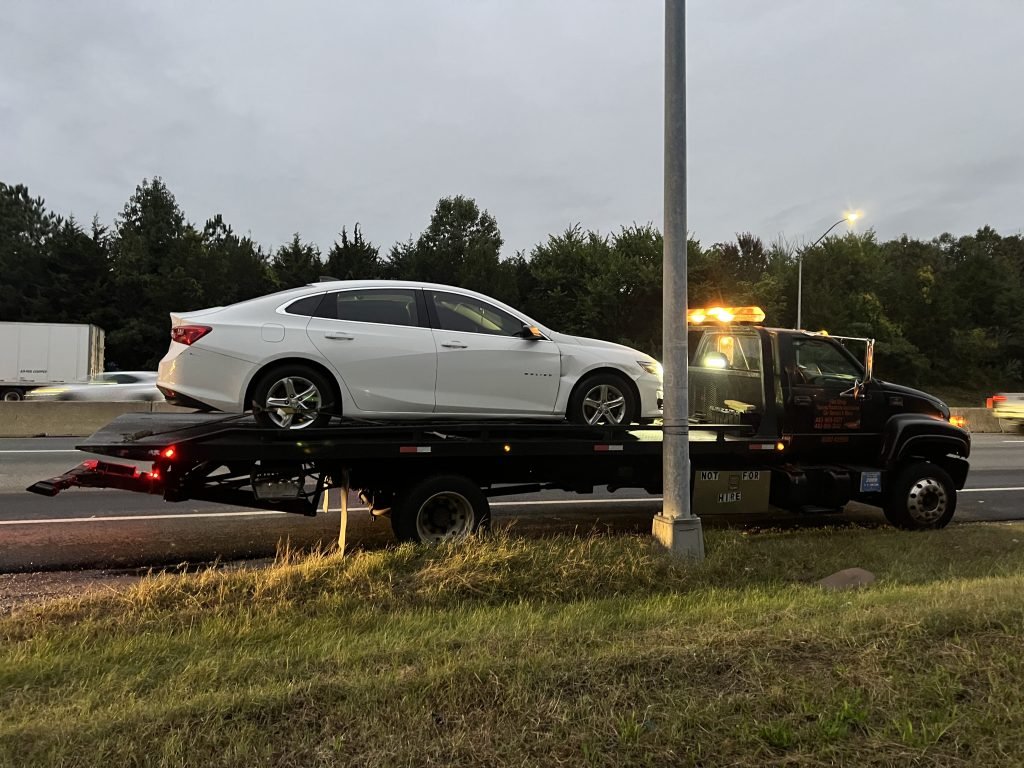 I got Whipz Towing & Roadside Assistance with a white chevy impala towing near me from I-695 W Security Blvd exit to 7100 Ritchie Hwy Glen Burnie, MD 21061