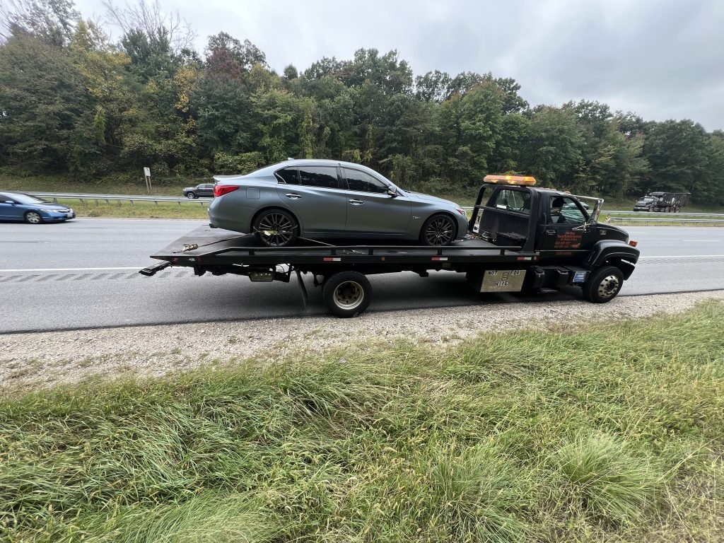 I got Whipz Towing & Roadside Assistance with a blue infiniti g37s towing near me from I-70 W to 6400 Lehnert St Gwynn Oak, MD 21207