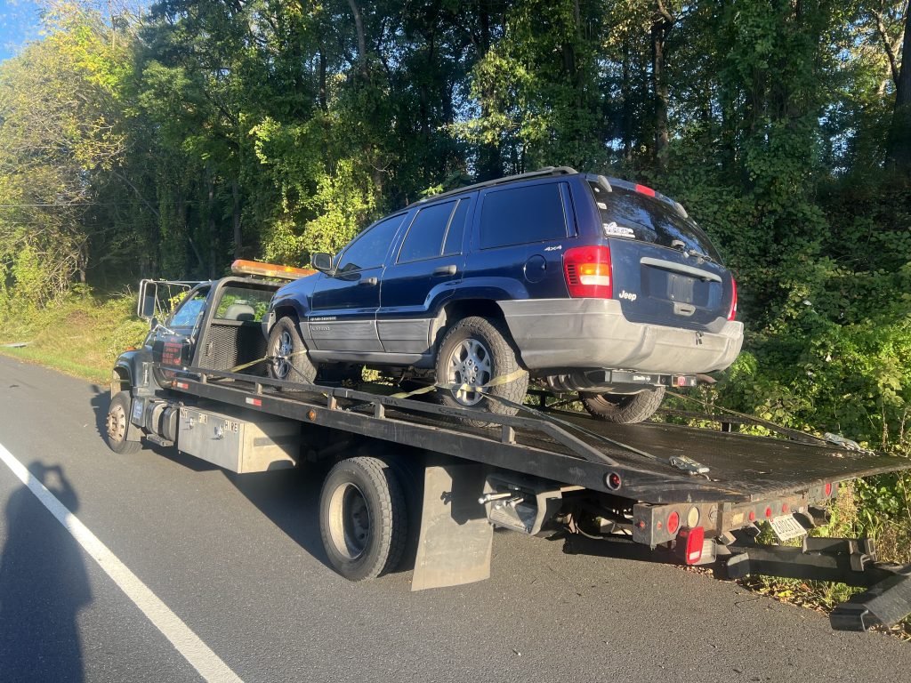 I got Whipz Towing & Roadside Assistance with a blue jeep Cherokee towing near me fromI-70 W to 8200 Pembrook Ct Frederick,MD 21704
