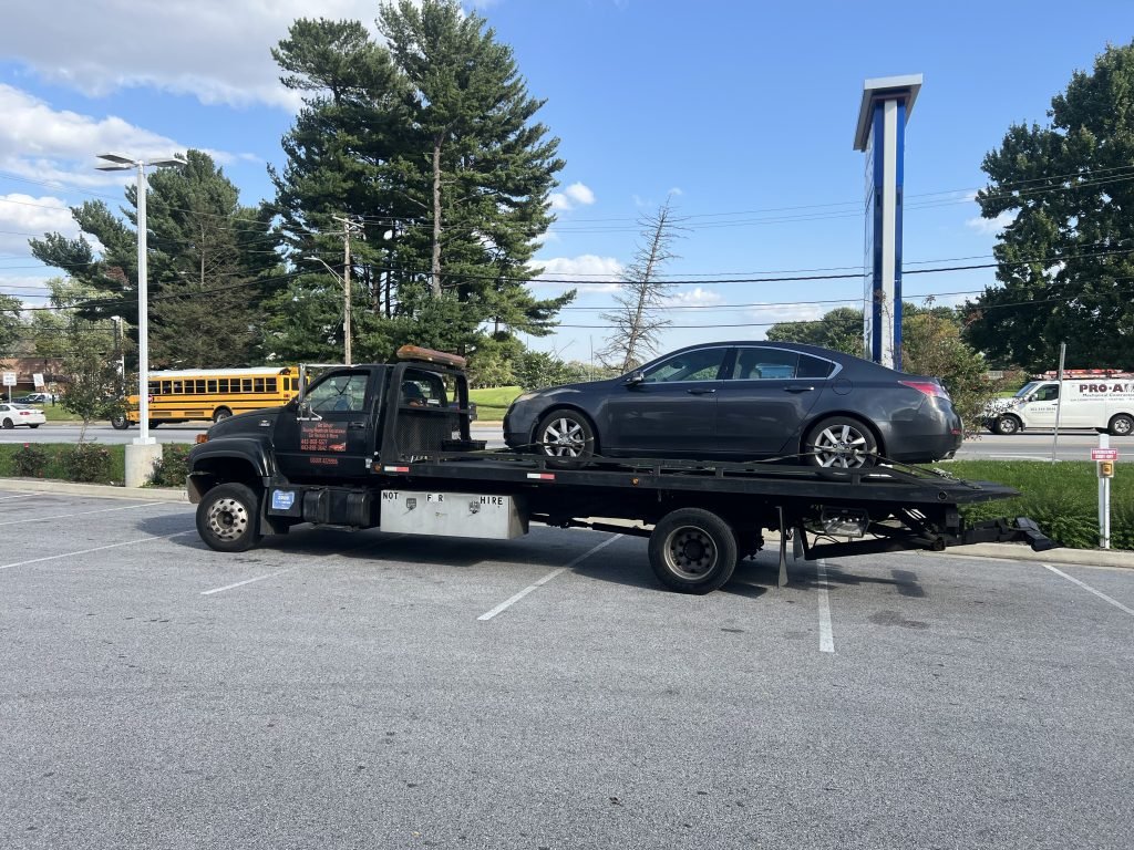 I got Whipz Towing & Roadside Assistance with a grey Acura Tl towing near me from 2000 N.Forest Park ave Windsor Mill,MD 21207 to 100 Caraway rd Reisterstown,MD 21136