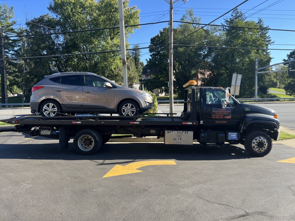 I got Whipz Towing & Roadside Assistance with a brown Nissan rogue towing near me from 4600 Ashforth Way Owings Mills, MD 21117 to 10600 Reiserstown rd Owings Mills, MD 21117