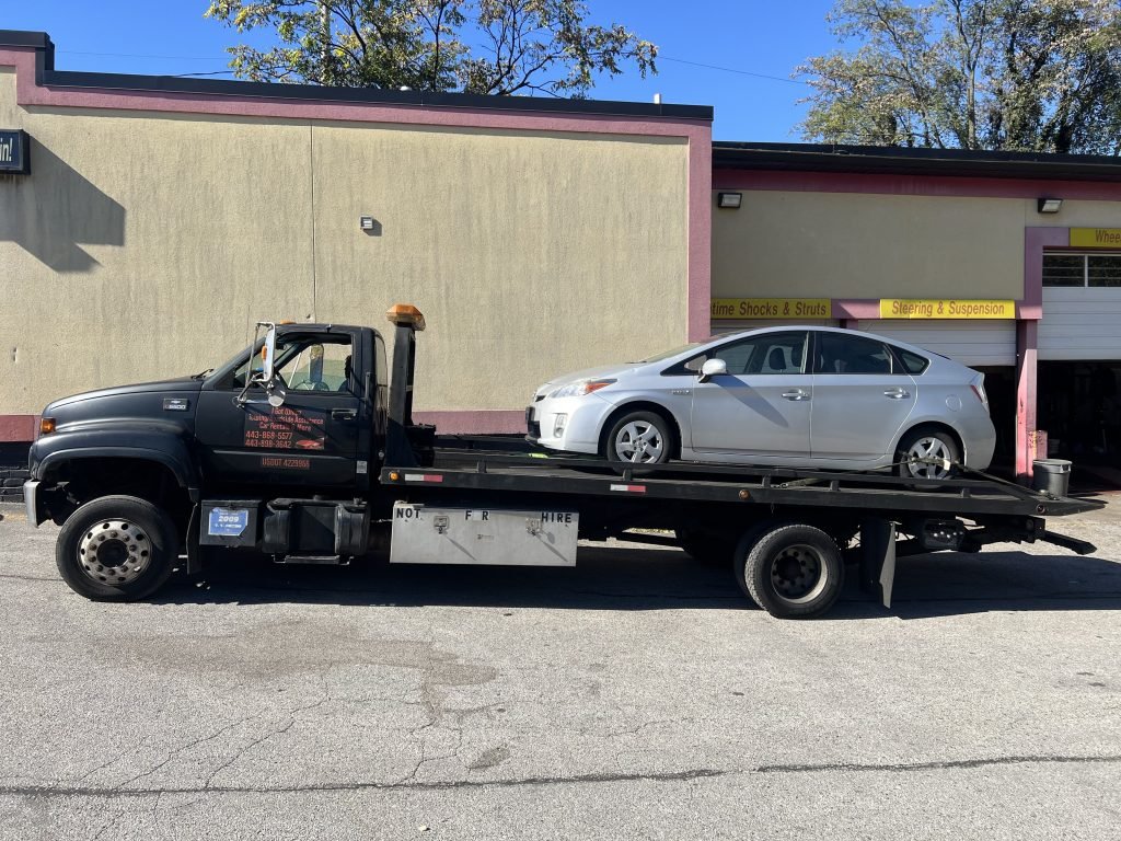 I got Whipz Towing & Roadside Assistance with a grey toyota prius towing near me from 7200 Ambassador rd Windsor Mill, MD 21244 to 5900 liberty rd Baltimore, MD 21207