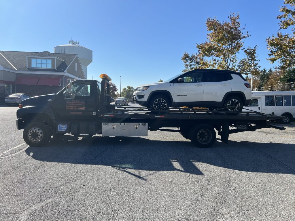 I got Whipz Towing & Roadside Assistance with a white jeep trackhawk towing near me from 2800 rolling rd Baltimore, MD 21244 to 5600 Baltimore National Pike Catonsville, MD 21228