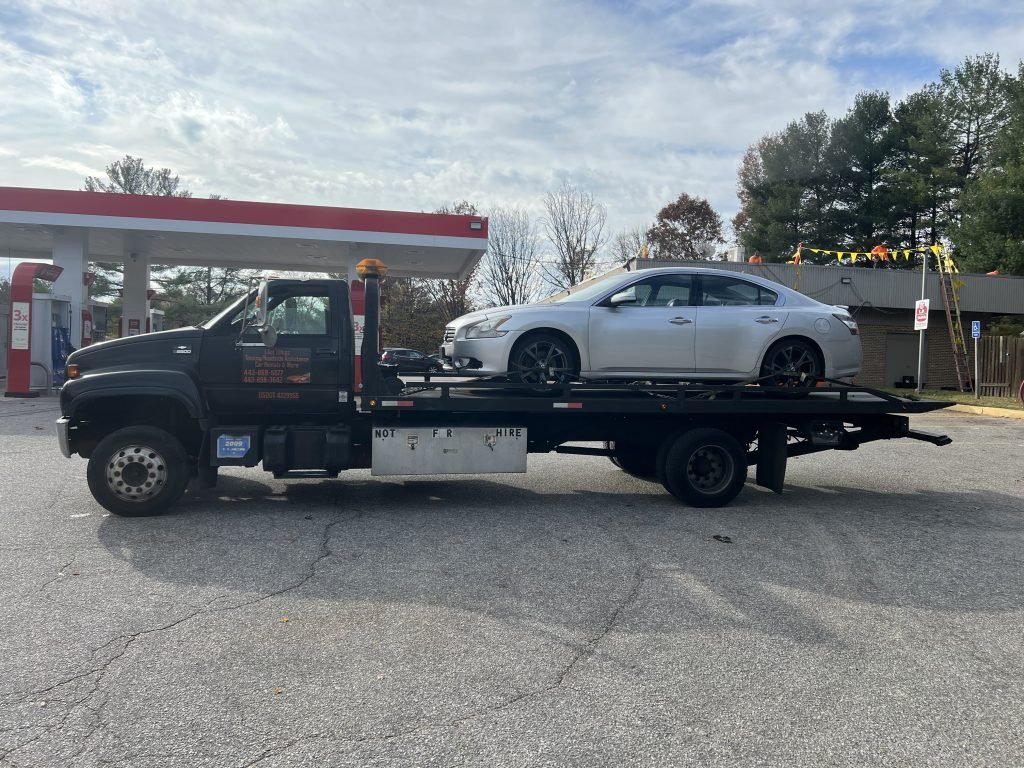 I got Whipz Towing & Roadside Assistance with a silver nissan altima towing near me from 8800 centre park dr coolumbia, MD 21045 to 2900 Garrison blvd Baltimore, MD 21216