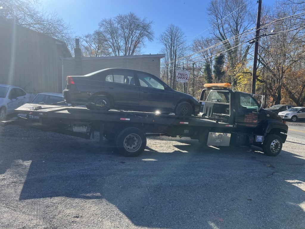 I got Whipz Towing & Roadside Assistance with a blk honda civic towing near me from 5300 dogwood rd woodlawn, MD 21207 to 2600 kennedy ave Baltimore, MD 21218