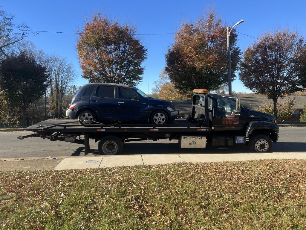 I got Whipz Towing & Roadside Assistance with a blue pt cruiser towing near me from 5500 Haddon ave Baltimore,MD 21207 to 1500 edison hwy Baltimore, MD 21213