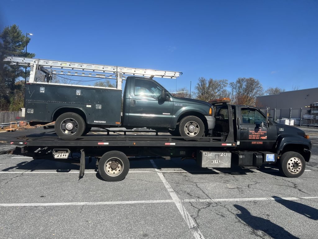 I got Whipz Towing & Roadside Assistance with a green ford f-250 towing near me from I-695 S exit 15 Catonsville, MD 21228 to 6000 Baltimore National Pike Catsonville, MD 21228