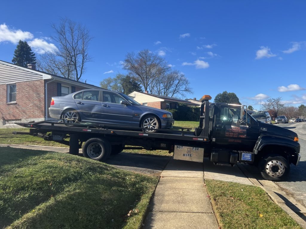 I got Whipz Towing & Roadside Assistance with a blue bmw 3 series towing near me from 8200 church ln milford mill, MD 21244 to 3500 mayfair rd lochearn, MD 21207