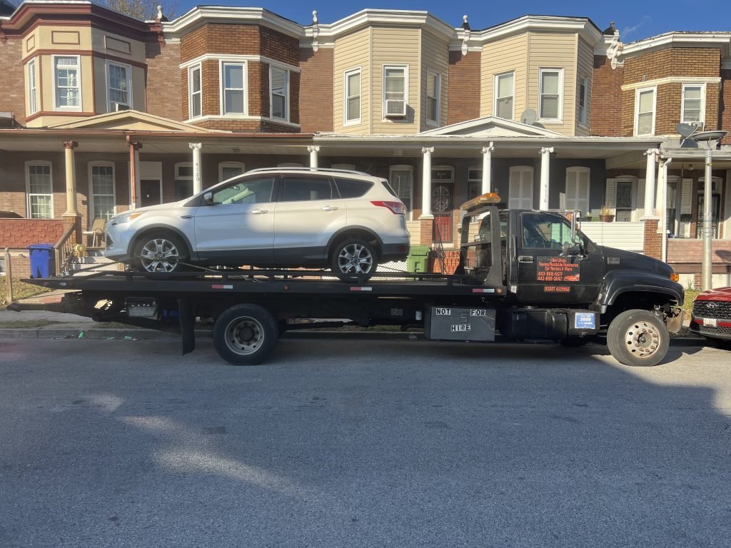 I got Whipz Towing & Roadside Assistance with a white ford truck towing near me from 4100 Walrad st Baltimore, MD 21229 to 5200 Baltimore National Pike Baltimore, MD 21229