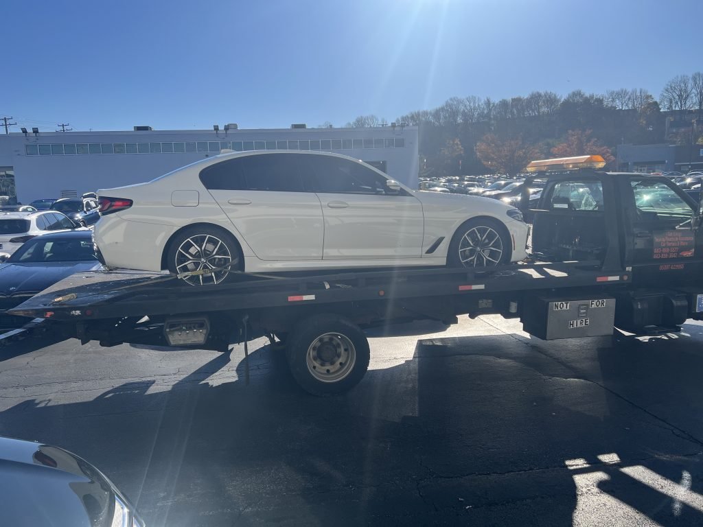 I got Whipz Towing & Roadside Assistance with a white bmw m series towing near me from 4200 Labyrinth rd Baltimore, MD 21215 to 9700 Reiserstown rd Owings Mills, MD 21117