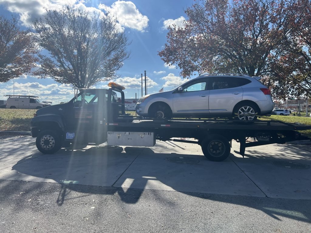 I got Whipz Towing & Roadside Assistance with a silver nissan rogue towing near me from 1600 belmont ave Baltimore, MD 21244 to 3700 Parkview ave Baltimore, MD 21215