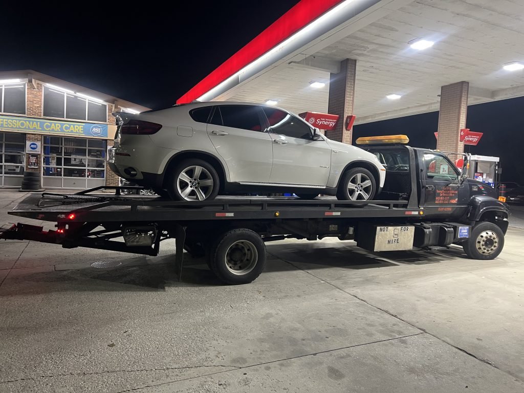 I got Whipz Towing & Roadside Assistance with a white BMW X series towing near me from 3700 Sequoia ave Baltimore, MD 21215 to 6200 N Charles St Baltimore, MD 21212