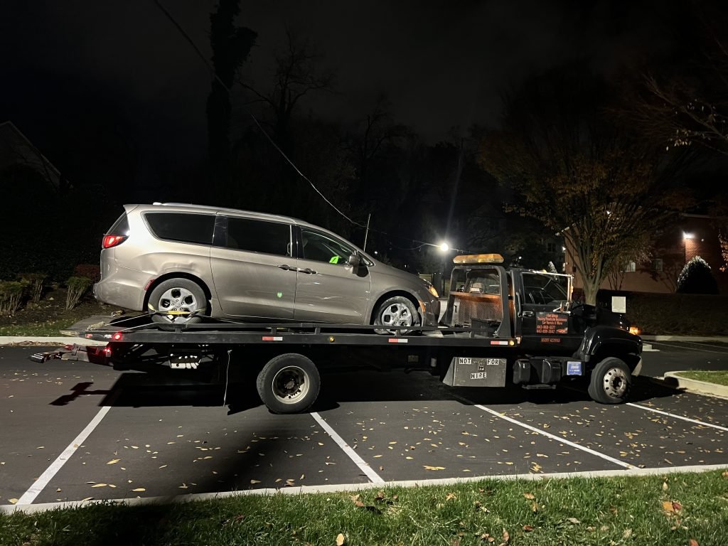 I got Whipz Towing & Roadside Assistance with a brown Chyrsler Pacifica towing near me from 1000 Woodson rd Baltimore, MD 21239 to 5700 Baltimore National Pike Baltimore, MD 21228