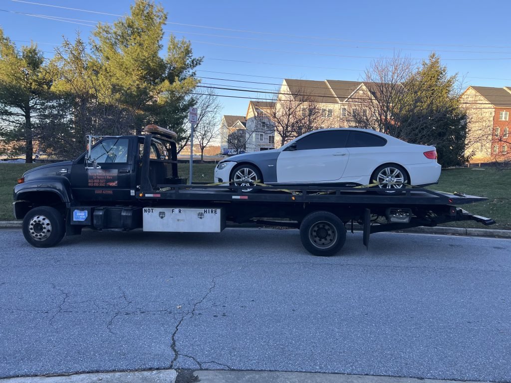 I got Whipz Towing & Roadside Assistance with a white bmw coupe towing near me from 7800 cornerstone way windsor mill, MD 21244 to 2000 leland ave middle river, MD 21220