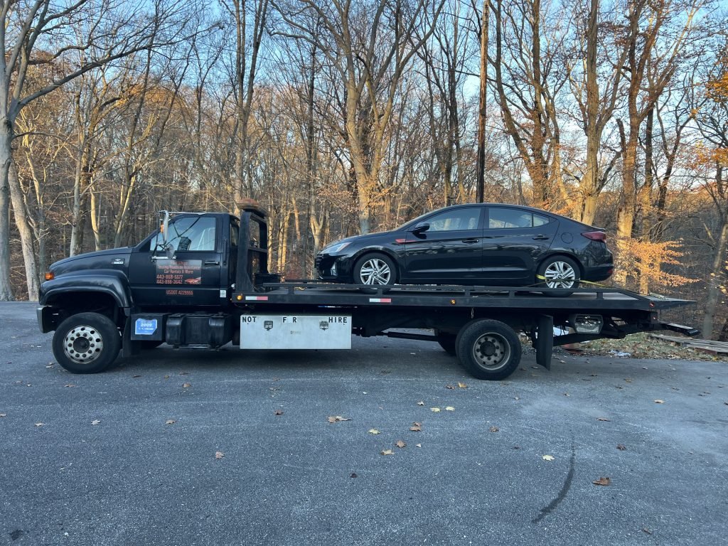 I got Whipz Towing & Roadside Assistance with a black hynudai elantra towing near me from I-695 N exit 17 Baltimore, MD 21207 to 7800 Greenspring ave Pikesville, MD 21208