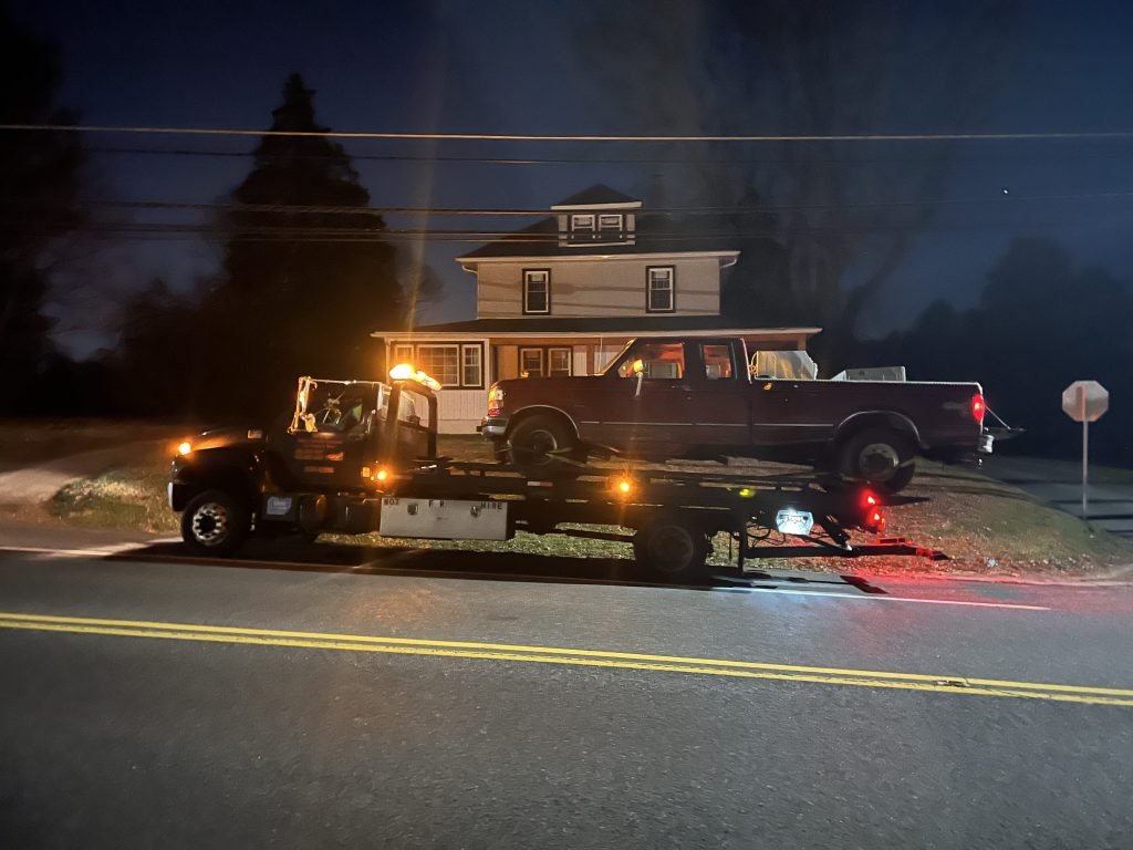 I got Whipz Towing & Roadside Assistance with a red ford F-250 towing near me from 10000 liberty rd Randallstown, MD 21133 to 3800 Offutt rd Randallstown, MD 21133