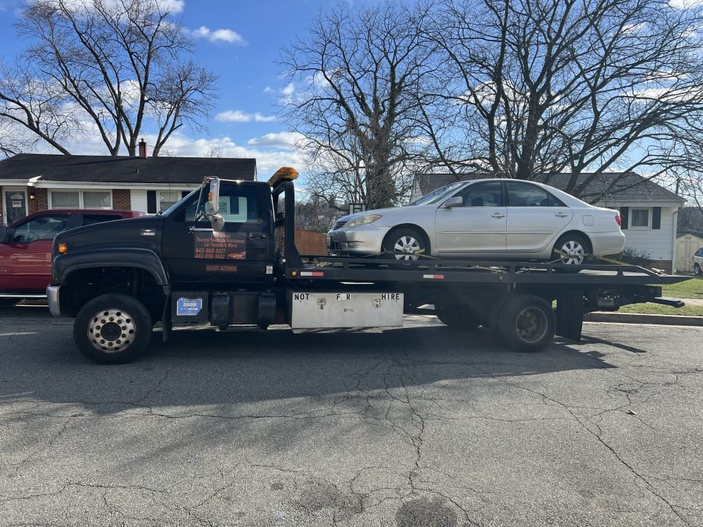 I got Whipz Towing & Roadside Assistance with a grey toyota camry towing near me from 6400 windsor mill rd Woodlawn, MD 21207 to 600 S Smallwood st BBaltimore, MD 21223