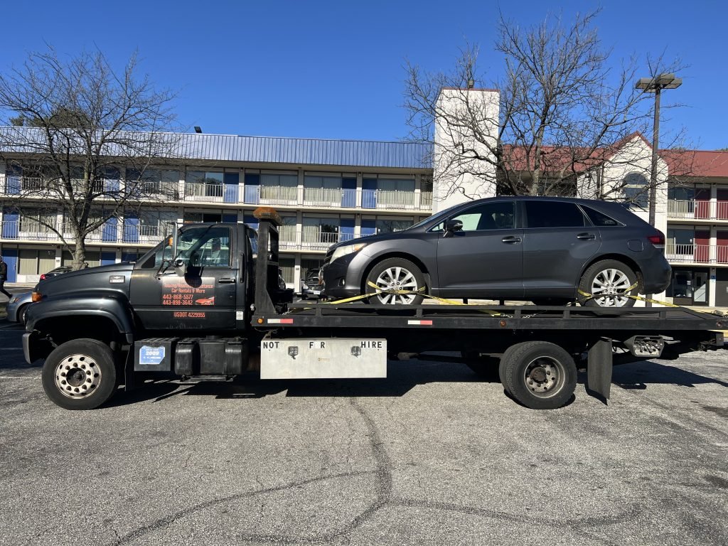 I got Whipz Towing & Roadside Assistance with a grey Toyota Sequoia towing near me from 6500 Security Blvd Woodlawn, MD 21207 to 9300 Georgia ave Silver Spring, MD 20910
