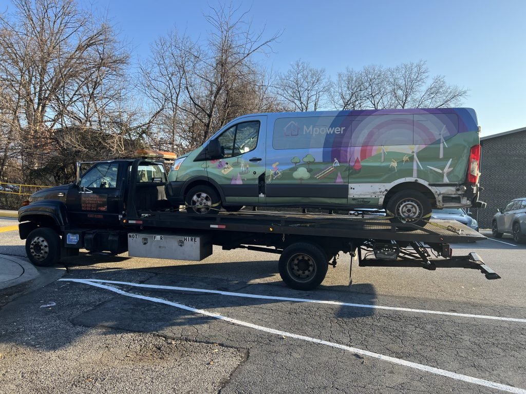I got Whipz Towing & Roadside Assistance with a rainbow ford transit towing near me from 3100 Windsor Blvd Lochearn, MD 21207 to 6677 Reiserstown rd Baltimore, MD 21215