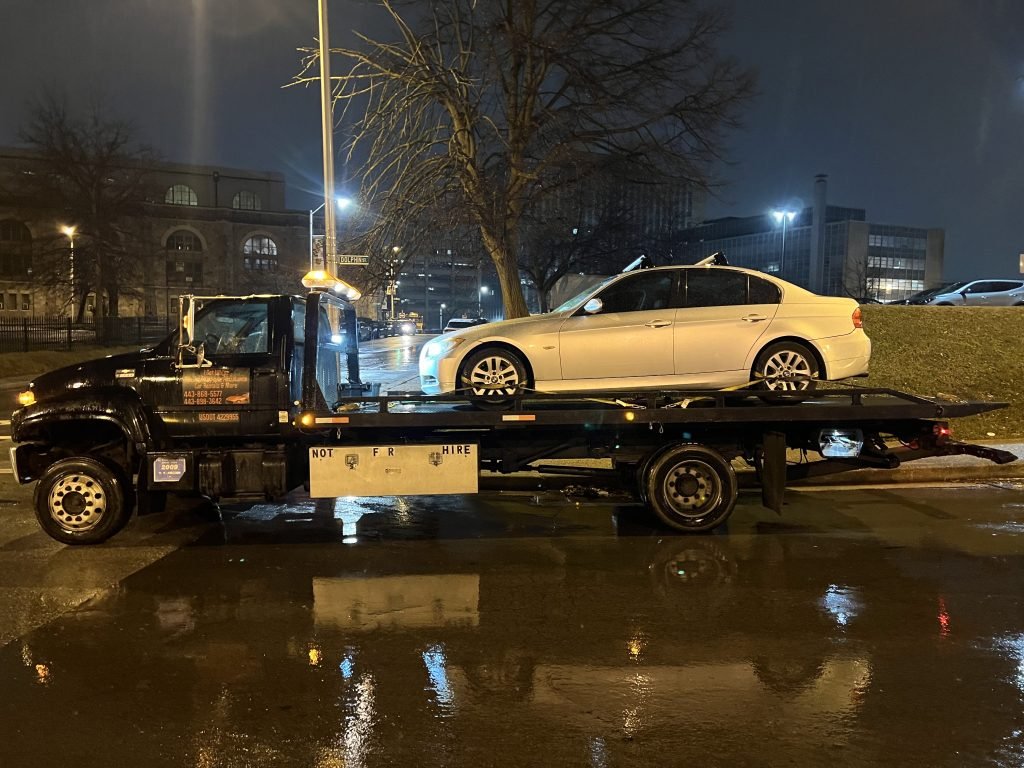 I got Whipz Towing & Roadside Assistance with a white bmw 5 series towing near me from 300 dolphin st baltimore, MD 21217 to 6821 Dogwood rd Windsor Mill, MD 21244
