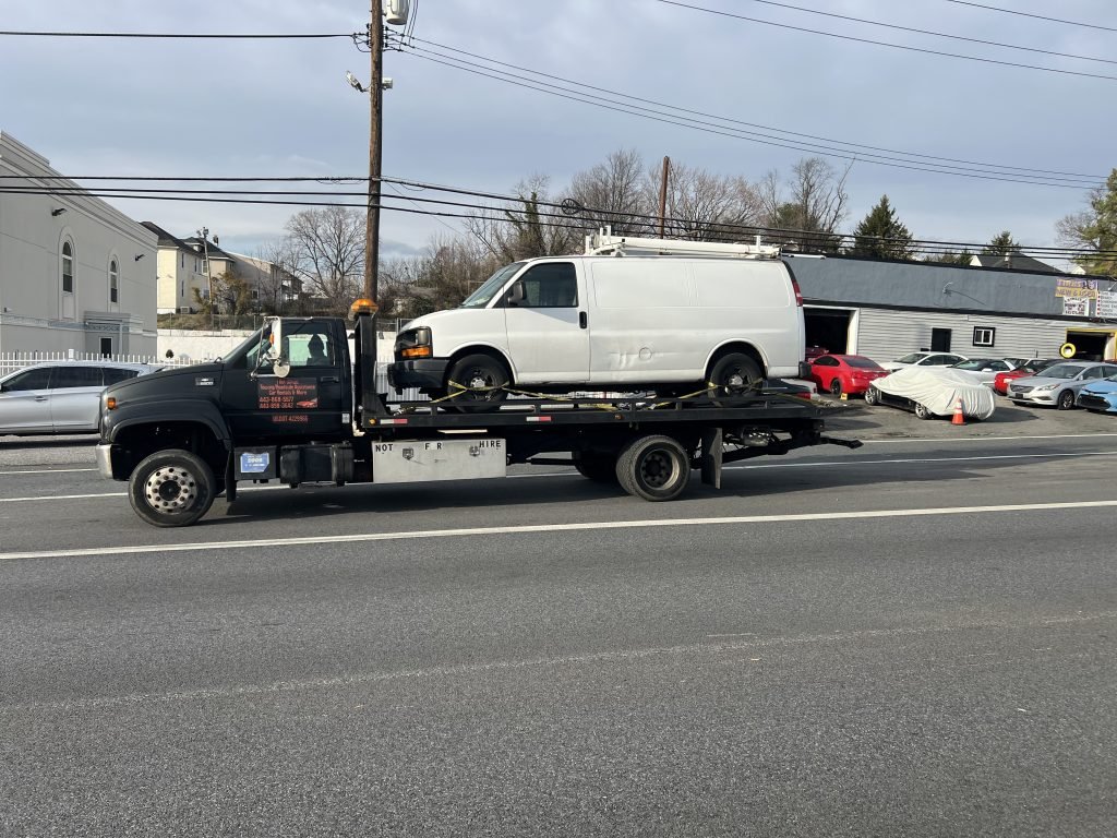 I got Whipz Towing & Roadside Assistance with a white chevy commercial van towing near me from 7300 pulaski highway baltimore, MD 21237 to 5209 Reiserstown rd Baltimore, MD 21215