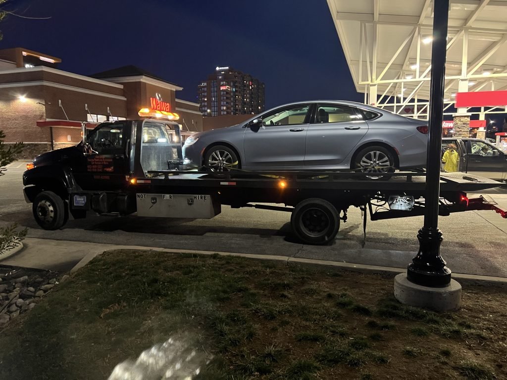I got Whipz Towing & Roadside Assistance with a blue chrysler 200 towing near me from 7710 Milestone Pkwy, Hanover, MD 21076 to 700 Westhills Pkwy Baltimore, MD 21229