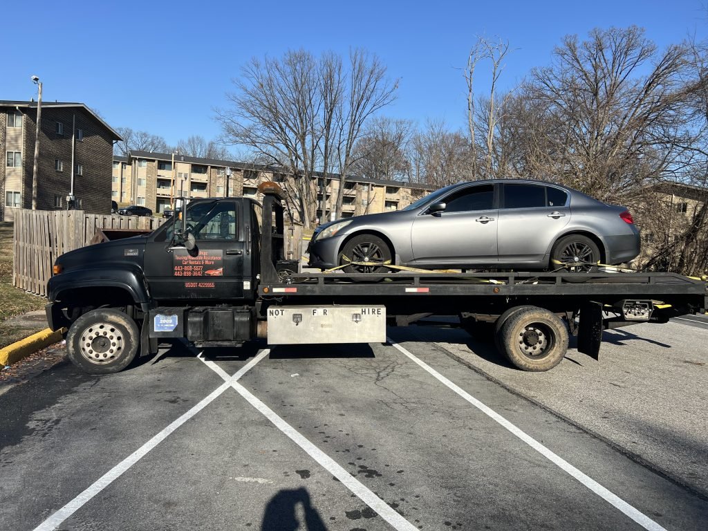 I got Whipz Towing & Roadside Assistance with a grey infiniti g37X towing near me from 6735 townbrook dr gwynn oak, MD 21207 to 6006 Liberty Rd, Baltimore, MD 21207