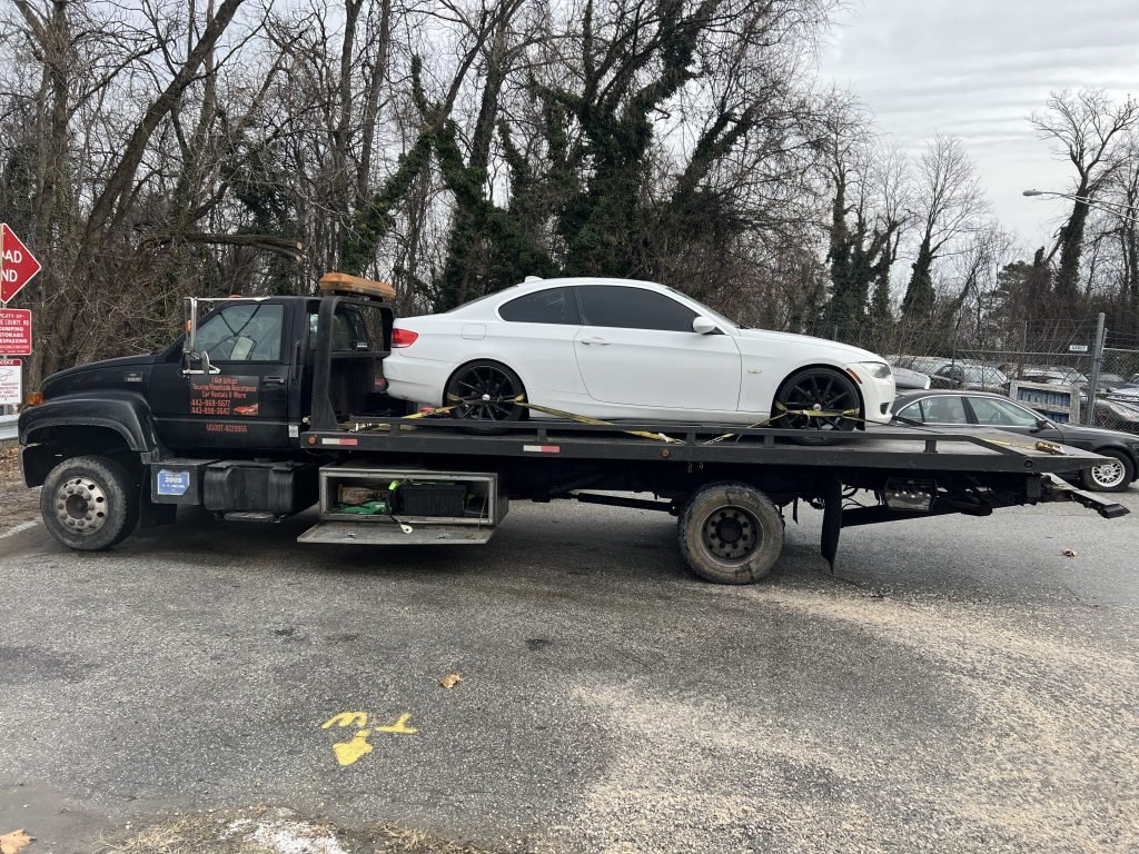 I got Whipz Towing & Roadside Assistance with a white BMW 4 series towing near me from 1030 Leslie ave Catonsville, MD 21228 to 384 Central Park Drive Harrington, DE 19952